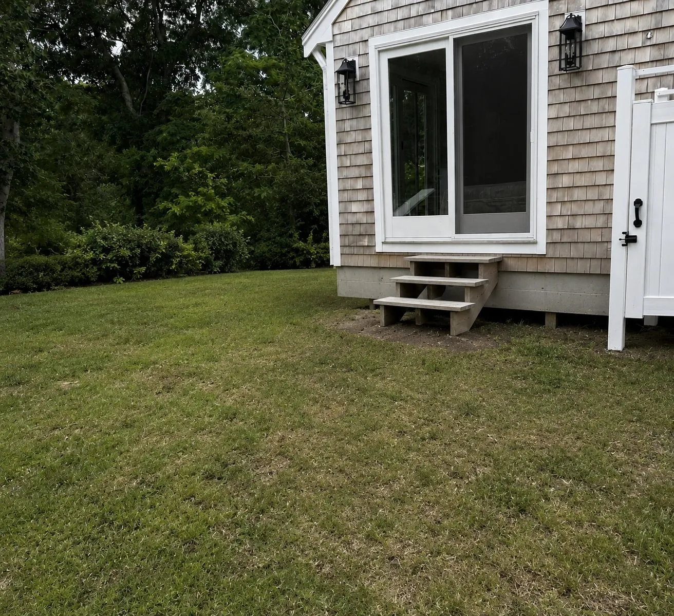 Before: a plain temporary step at the back door