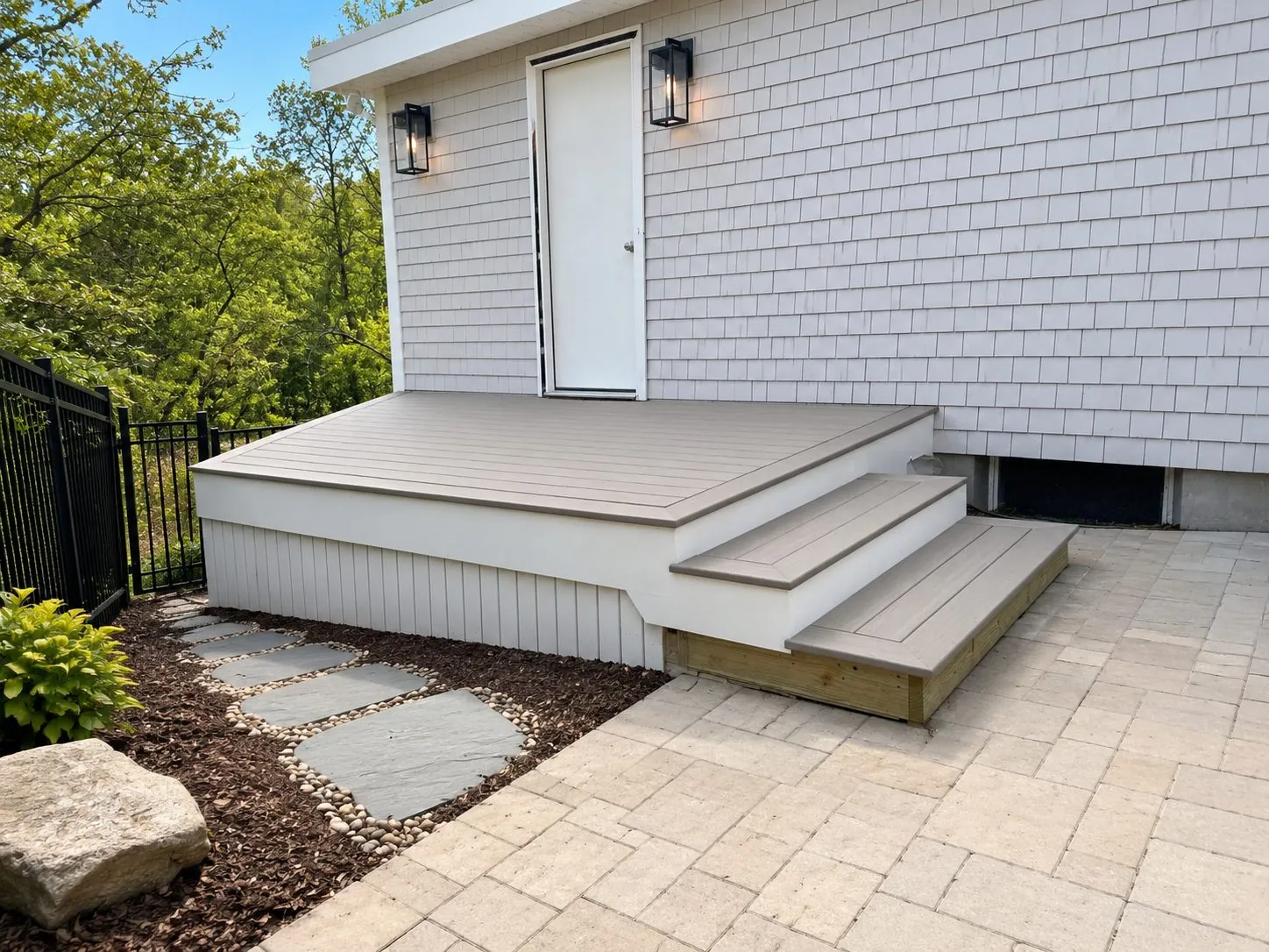 Composite deck with cable rail and wood top rail
